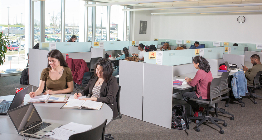 Photo of students at the Library